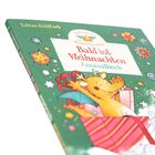 Titel: "Bald ist Weihnachten - Ausmalbuch". Illustration: Ein fröhlicher Drache in Geschenkverpackung auf grünem Hintergrund.