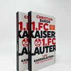 Zwei Bücher mit dem Titel "1. FC Kaiserslautern" von Christian Baron, Ullstein Verlag, stehen nebeneinander.