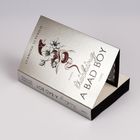 „Tricking a Bad Boy“, Roman von Leandra Seyfried. Cover mit Blumen- und Schlangendesign in Rot und Schwarz.