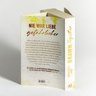 "NIE WAR LIEBE gefährlicher" steht oben. Rechts: "DRAWN Together MERCEDES RON". Buch mit gelbem Design und Klappentext.