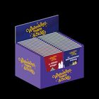 "Weihnachtsmann & Co. KG", "Der Glücksbringer", "Die Weihnachtsmann Prüfung". Lila Displaybox, Bücher aufgestellt.