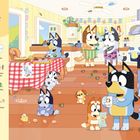 "In der Küche. Die Heelers bereiten ein paar Oster-Leckereien vor, die sie Freunden und Familie anbieten wollen." Illustrationen von Hunden in einer bunten Küche, Ostermotive, voller Leckereien und Eier.