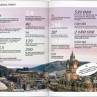 Zahlen zu Edinburgh vor Hintergrund von Stadt und Hügeln. Erwähnt werden z.B. Einwohnerzahlen und historische Fakten.