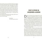 "Die Flüsse in unseren Adern" steht als Überschrift. Der Text beschreibt Erlebnisse im Regenwald und die Forschung von Paul Rosolie.