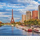 Im Vordergrund "FEB", darunter Zahlen. Die Seine mit Boot, links der Eiffelturm und moderne Gebäude rechts. Himmel mit Wolken.