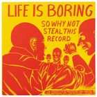 Text "SMACK!" in einer Illustration auf einem Schallplatten-Etikett, zeigt ein Auto mit einem küssenden Paar.