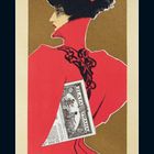 Eine elegante Frau im roten Mantel mit großem Hut, hält "Zlata Praha". Unten Kalender mit Februar-Daten 2021.