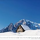 Kalenderblatt mit den Daten 1 bis 28, Monat Februar. Schneebedecktes Steinhaus vor schroffen, verschneiten Berggipfeln.