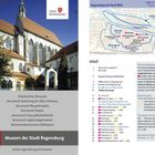 Links ist ein großes Foto einer Kirche mit dem Text "STADT REGENSBURG". Rechts oben ein Stadtplan mit Sehenswürdigkeiten.