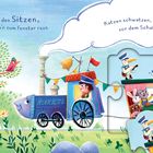 Texte: „Hasen hocken auf den Sitzen...", „Katzen schwatzen...". Illustration: Tiere in einem Zug, im Vordergrund ein Baum mit Tieren.