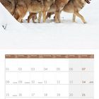 Kalender für Februar 2027 mit Wölfen im Schnee. Wochentage in Deutsch und Englisch, Daten von 01 bis 28.