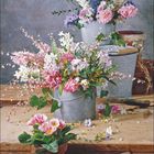 2 | 2027 unten links, darunter ein Monatskalender. Blumentöpfe mit bunten Blumenarrangements auf einem Holztisch.