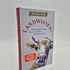 Buchtitel: "LANDWISSEN!" und Autor: Nicola Förg. Illustration einer bunten Kuh auf dem Cover. "SPIEGEL Bestseller-Autorin".