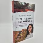 "DEM OUTBACK ENTKOMMEN" von Carolina Wilga, Überlebenskampf in Australien. Cover zeigt Frau und Outback-Szene.