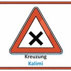"Kreuzung Kalimi" steht unter einem roten Dreieck mit schwarzem Kreuz, zeigt eine Kreuzung an.