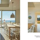 "The interiors are rendered in light tones to reflect the ever-changing natural light."  
Esszimmer mit großen Fenstern, Meerblick.