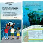 Texte: 
1. "DIE SCHÄTZE DER TITANIC"
2. "Saint John’s (Neufundland)"
3. "TAUCHT AB!"
4. Hinweis: "Wie man ein Kreuzworträtsel..."

Links: Karte, Erklärung zur Titanic. Rechts: Unterwasser, Wrack, Personen beobachten, Kreuzworträtsel.