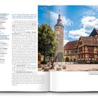 Reisemobilstellplätze und E-Bike Ladestationen entlang der Route; Bild: Kurmainzisches Schloss, Fachwerk, blauer Himmel.
