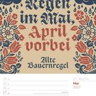 “Regen im Mai, April vorbei. Alte Bauernregel.” Kalender für Mai 2027, 21. Woche, dekorativ mit Blumen.
