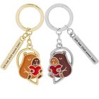 Anhänger-Texte: „Ich hab Dich soooo lieb.“ Illustration: Zwei Biber mit Herzen, einer in Gold, der andere in Silber.