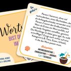 Zwei Karten mit Spielanleitung und Titel "Wortspiel" in dekorativer Schrift. Eine Illustration mit Strandmotiven ziert eine Ecke.