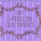 "Herrlichen Glückwunsch" in geschwungener Schrift auf lila Hintergrund, umrahmt von floralen Ornamenten.