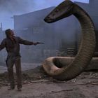 Im Hintergrund Schilder: "SHERIFF" und "M. KELLEY LIVERY". Vordergrund: Eine Person mit Revolver zielt auf riesige Schlange.