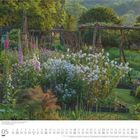 05 Dumont Kalenderseite zeigt einen blühenden Garten mit weißen und rosa Blumen, umgeben von einer natürlichen Holzstruktur.