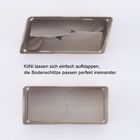 KiiNi lassen sich einfach aufklappen, die Bodenschlitze passen perfekt ineinander. Zwei aufklappbare, graue Boxen.