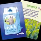"Wolfsmilch" und "Milch von glücklichen Weidewölfen" sind die Texte. Illustration: Wolf auf einer Milchpackung, Pflanzenfoto.