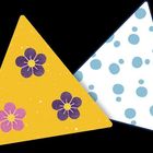 Zwei dreieckige Formen: Eine gelb mit violetten und rosa Blumen, eine weiß mit blauen Punkten.