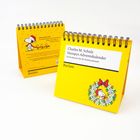 Kalender mit dem Titel "Charles M. Schulz Snoopy's Adventskalender". Auf gelbem Hintergrund ist Snoopy zu sehen.