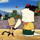 Zwei cartoonartige Tiere stehen sich gegenüber, umgeben von schwebenden roten Herzen.