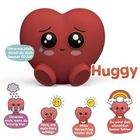 „Umarme mich, damit du dich besser fühlst!“ Ein rotes Herz mit einem traurigen Gesicht und großen Augen. Der Name „Huggy“.