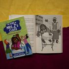 "The Kids in Mrs. Z's Class: Fia Hosein Finds Her Beat." Buchcover mit fröhlichen Kindern und offenes Buch mit Zeichnung.