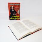 Buchcover: "Jutta Jacobi, Kristina von Schweden: Eine Biografie, Königin ohne Land, Reclam". Ein Buch liegt offen davor.