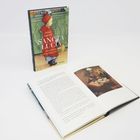 Buchcover mit Text "Selma Lagerlöf SANCTA LUCIA Schwedische Weihnachtsgeschichten". Ein weiteres, geöffnetes Buch daneben.