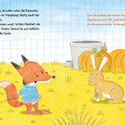 Zwei Rabbits und ein Fuchs neben einem Kürbis; Fuchs zieht einen Wagen voller Dinge; Text spricht von einer Suche.
