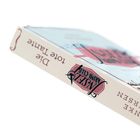 „Die Tote Tante“ und „INSEL KRIMI-CLUB“ sind auf einem schräg fotografierten Buchrücken zu lesen.