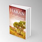 „Elizabeth Haran, Outbackträume, Australien-Roman“. Ein Baum steht in einer sonnigen, australischen Landschaft.