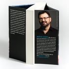 Text: Beschreibung von Realityshows, Flugmaschinen, eines Testpiloten, und Infos über Andreas Gruber. Foto eines Mannes.