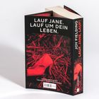 Text: „Lauf Jane. Lauf um dein Leben. Joy Fielding, Lauf. Jane, Lauf!“
Ein schwarzes Cover mit rotem Stöckelschuh.