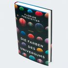 Buchtitel: "Die Farben des Universums" von Florian Freistetter, umgeben von bunten Planeten auf schwarzem Hintergrund.