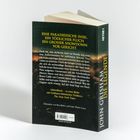 Ein Buch mit dem Titel "Die Legende" von John Grisham. Rückseitentext beschreibt eine Insel, einen Fluch und einen Gerichtsshowdown.