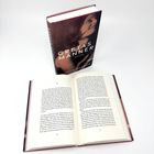 "JUDITH REUSCH, GRETAS MÄNNER, ROMAN" auf einem Buchcover, dazu eine Frau in Schwarz-Weiß. Ein offenes Buch.