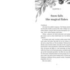 Kapitel 1: "Snow falls like magical flakes" (Illustration mit Blumen oben rechts). Text erzählt eine Szene mit geschlossenen Augen.