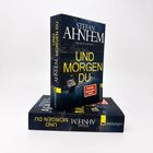 Buch "Und morgen du" von Stefan Ahnhem, Kriminalroman. Gelber Text auf dunklem Cover, "Spiegel Bestseller Autor".