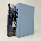 Zwei Bücher nebeneinander, eins mit Schutzumschlag, Titel: "RUGE", Autor: "CHRISTIAN NEEF", blauer Einband, schlichtes Design.