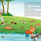 Der Text erzählt von Kindern, die einen Staudamm bauen. Illustration: Kinder spielen am Bach mit Ästen und Steinen.