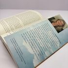 Text über Susanne Dopp auf Buchrückseite, Hintergrund in Himmelblau mit Wolken und ein Porträt einer lächelnden Frau oben rechts.